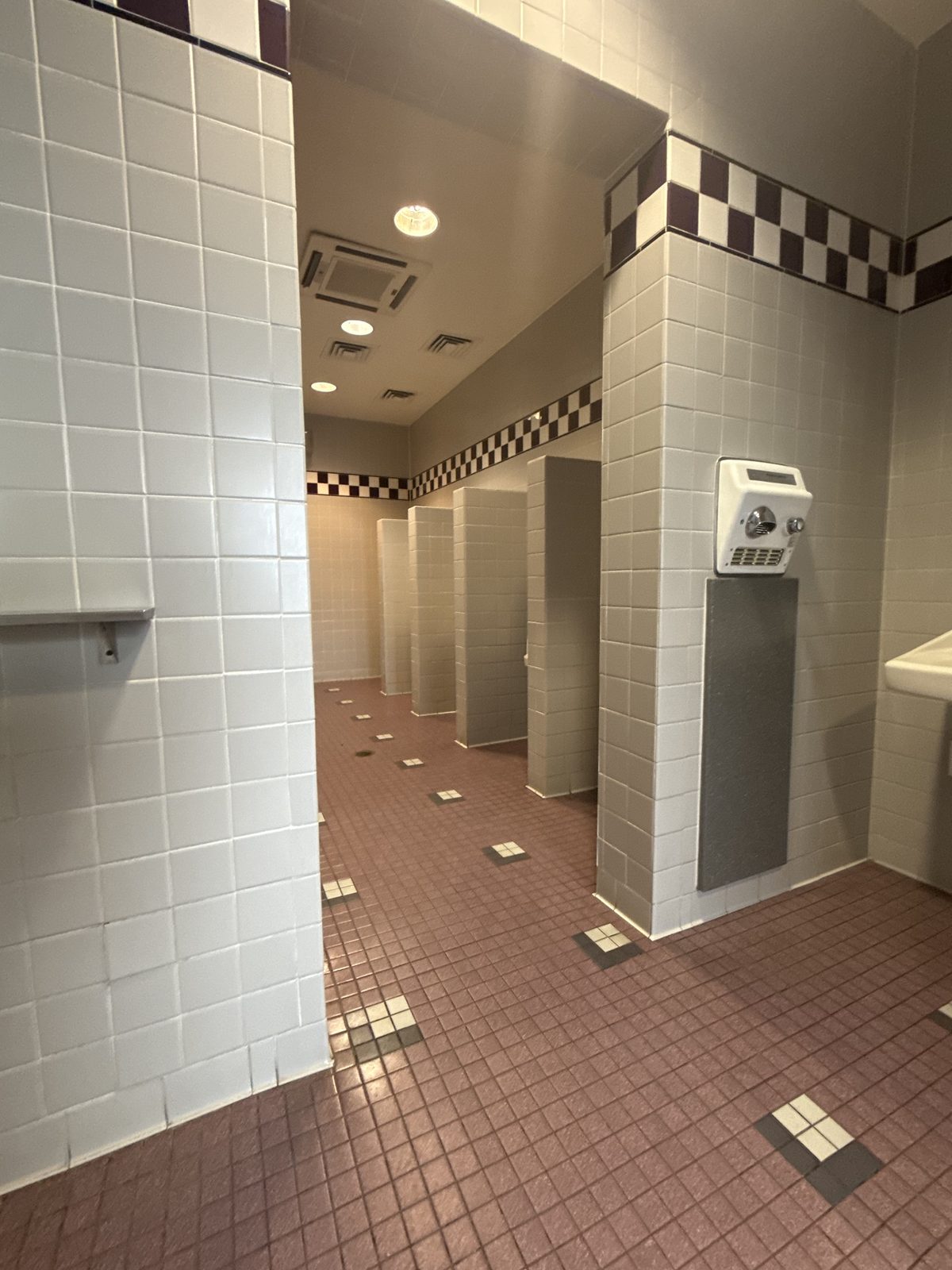 Renovated commercial restroom tile work